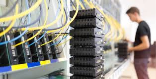"Technician performing network testing and certification in Oxnard, CA using advanced diagnostic tools to verify cable integrity, data transmission speed, and compliance with structured cabling standards.